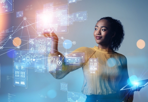 Lady pointing at digital virtual symbols